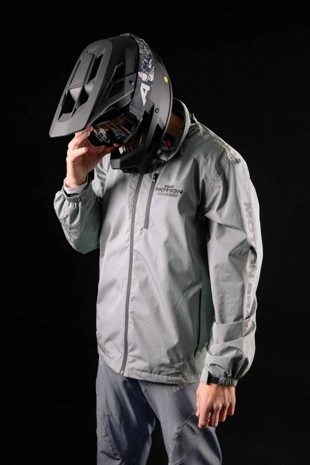 Grey Motion Trail Jacket Regenjacke (Grau) - The Motion Brand regenjacke windjacke lukas knopf merchandise windbreaker