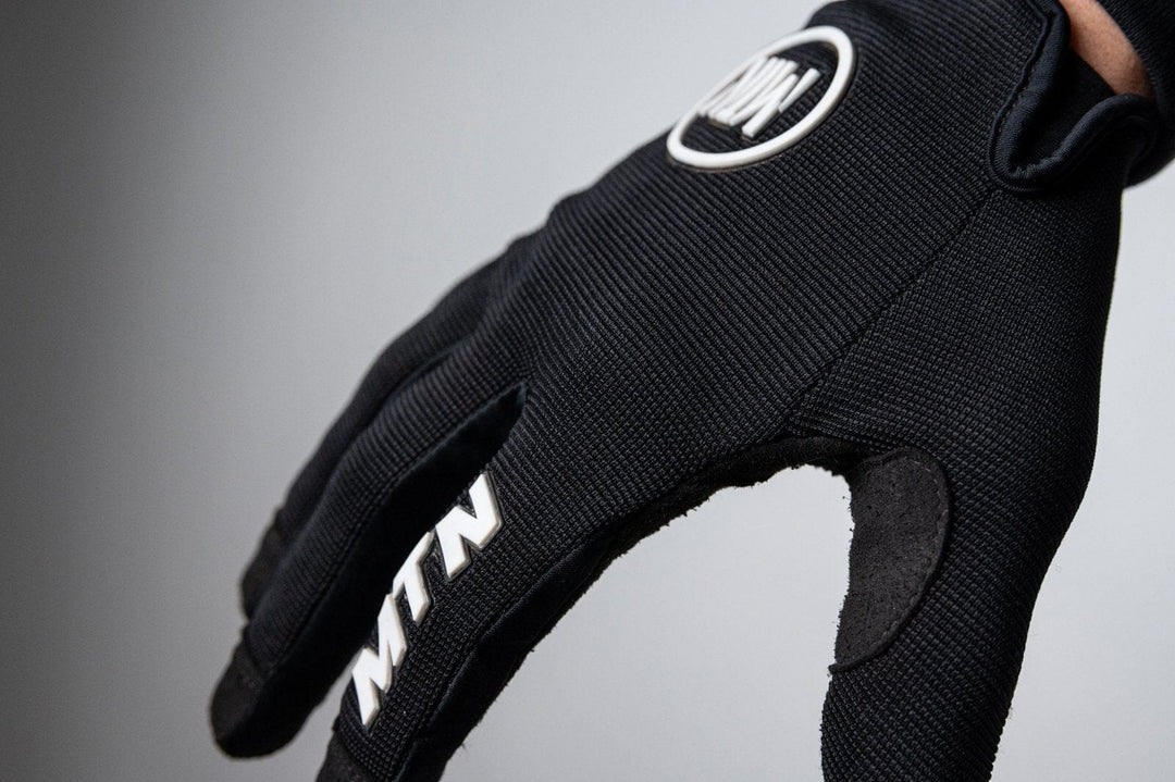 the motion brand handschuhe All Black MTB Handschuhe MTN – Lukas Knopf