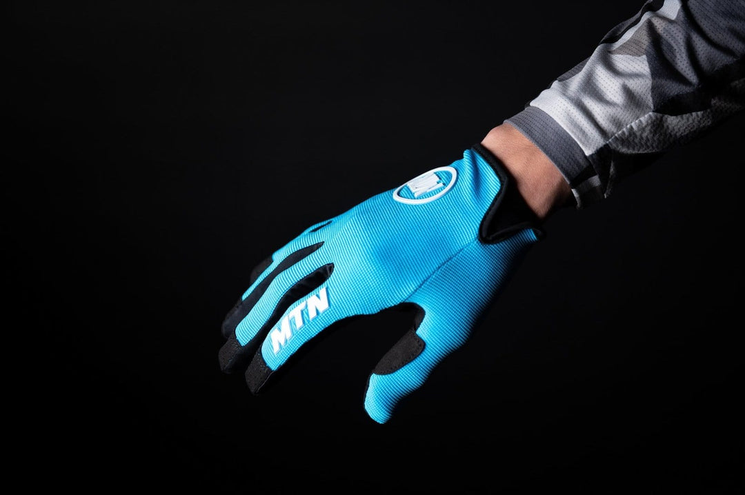 Blue MTB Handschuhe MTN - The Motion Brand Bike Gloves Bike Handschuhe Fahrradhandschuhe Bikewear Bike wear Glove Blau Blaue Fahrradhandschuhe Fahrradhandschuhe mit Handyfunktion Handschuhe Display bedienbar Fahrradhandschuhe smartphone smartphone handschuhe mtb handschuhe mtb glove mountainbike handschuhe blau